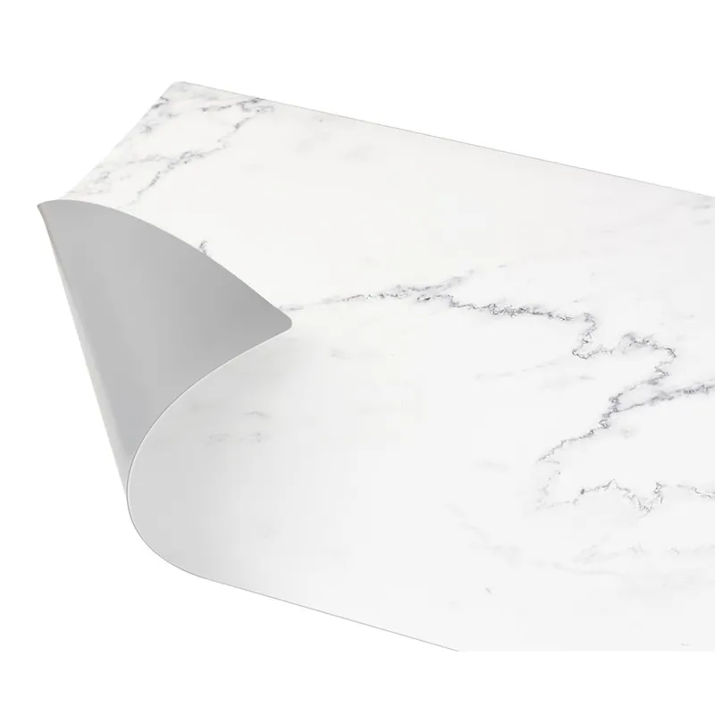 Bezpieczne zakupy Płyta ochronna na kuchenkę z PVC 60x52 cm Marble – Wenko Bonami